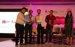 INFIDIGIT & Myntra Team receiving the Indian Content leadership award 2018 For best content in a search marketing Campaign