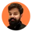 Anuj-Gupta-orange.webp Anuj-Gupta-orange.webp